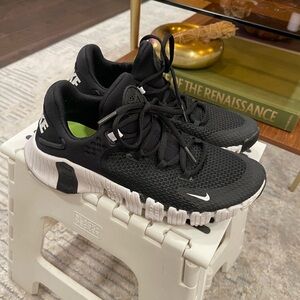 Nike Women’s  Black and White Metcon